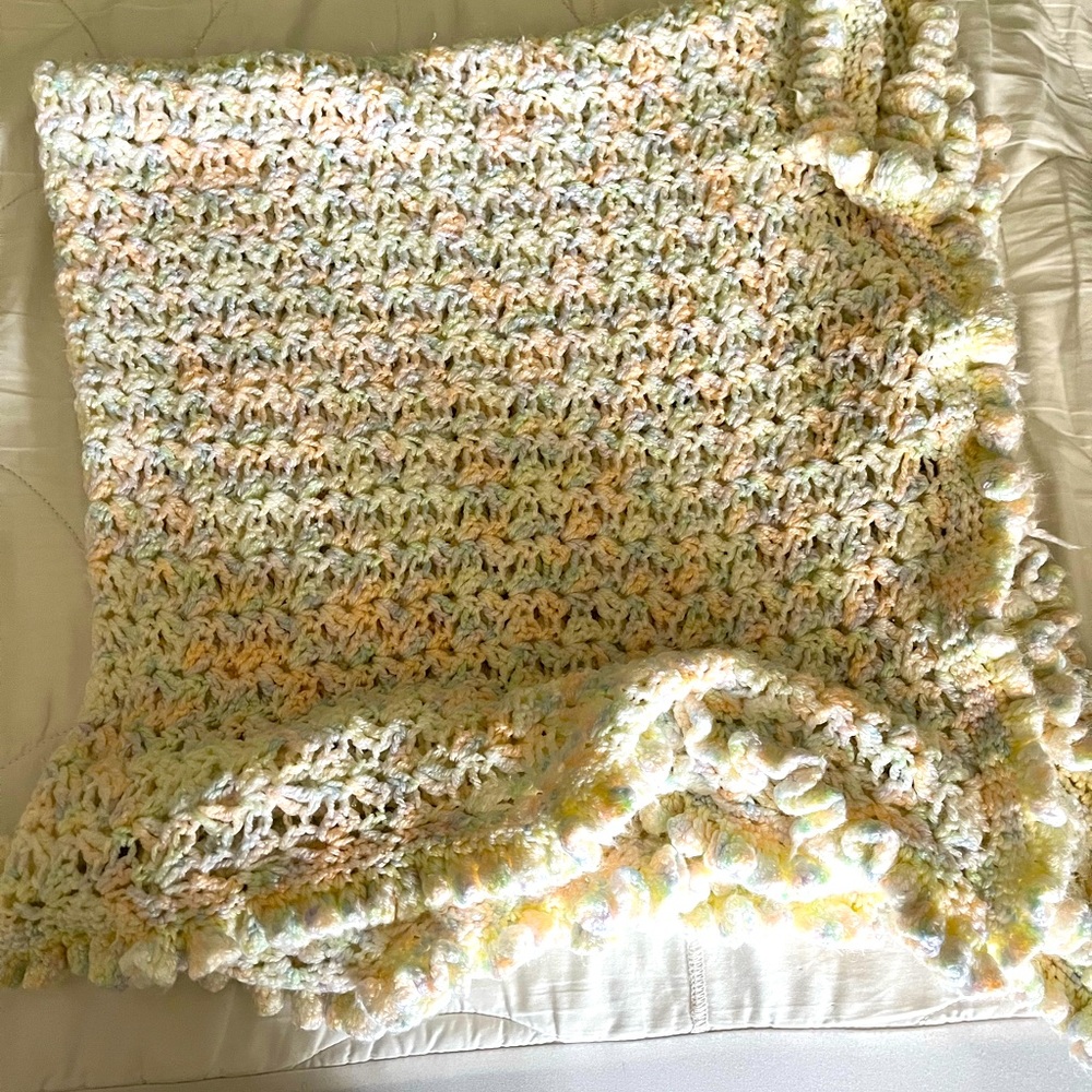 beautiful white and pastel handmade baby blanket